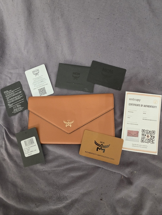 MCM Handbags - AUTHENTIC NWT - MCM Cognac Envelope Wallet with Gold Logo